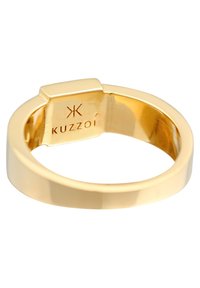 Gold-tone ring with a smooth, polished surface and a flat band design. Inside engraving reads "Kuzzoï." Minimalist style, no additional embellishments.