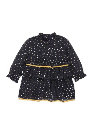 Navy dress with long sleeves, gold heart pattern, layered ruffle design, and a gold trim at the waist and hem. Soft, flowing fabric.