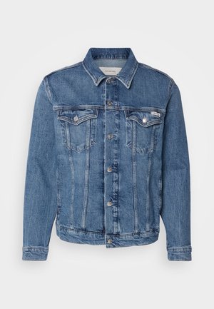 Sininen farkkutakki napituksella edessä, kahdella rintataskulla ja ommeltuine yksityiskohtineen. Sisältää klassisen kauluksen ja pitkät hihat.