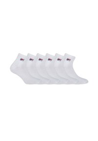 Chaussettes blanches pour cheville avec une texture lisse, ornées d'un petit logo coloré sur le revers. Le pack contient six paires.