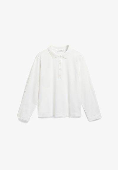 Biela polokošeľa s dlhým rukávom vyrobená z bavlny, s gombíkovou légou, rebrovaným golierom a priliehavým lemom na manžetách a spodnom okraji. Jednoduchý dizajn.