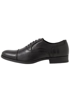 Black leather men's dress shoe with closed lacing and low heel, displayed in side profile on white background.