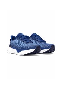Zapatillas deportivas azules con parte superior de malla texturizada, que presentan una entresuela blanca, suela de goma y cordones elásticos para un ajuste seguro.