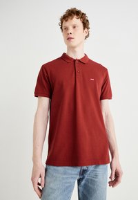 Levi's® Polo marškinėliai - fired brick