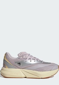 Svijetloplavi atletski tenisice sa srebrnim detaljima, bež debelim međuslojem oznake "Lightstrike" i smešnim gumiranim potplatom.