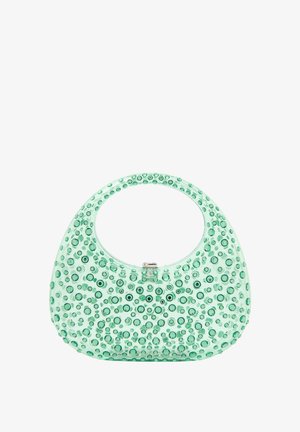 Zelená priehľadná kabelka s zaobleným tvarom, so zvýšenými kruhovými akcentmi a horným uchom. Uzáver na klip vpredu.