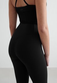 aim’n® Legíny – nohavice - black