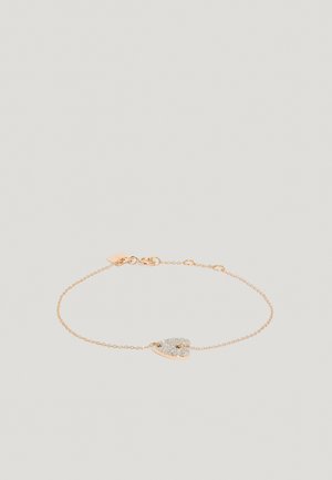 Kuldtoonist käevõru, millel on õrn kett ning südamekujuline ripats, millel on kaunistuseks väikesed säravad kivid. Krokodillikarabina sulgur.