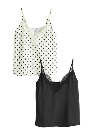 Zwei ärmellose Damentops, eines weiß mit schwarzen Polka-Dots und Spitzenbesatz, das andere einfarbig schwarz mit Spitzenbesatz am Ausschnitt.