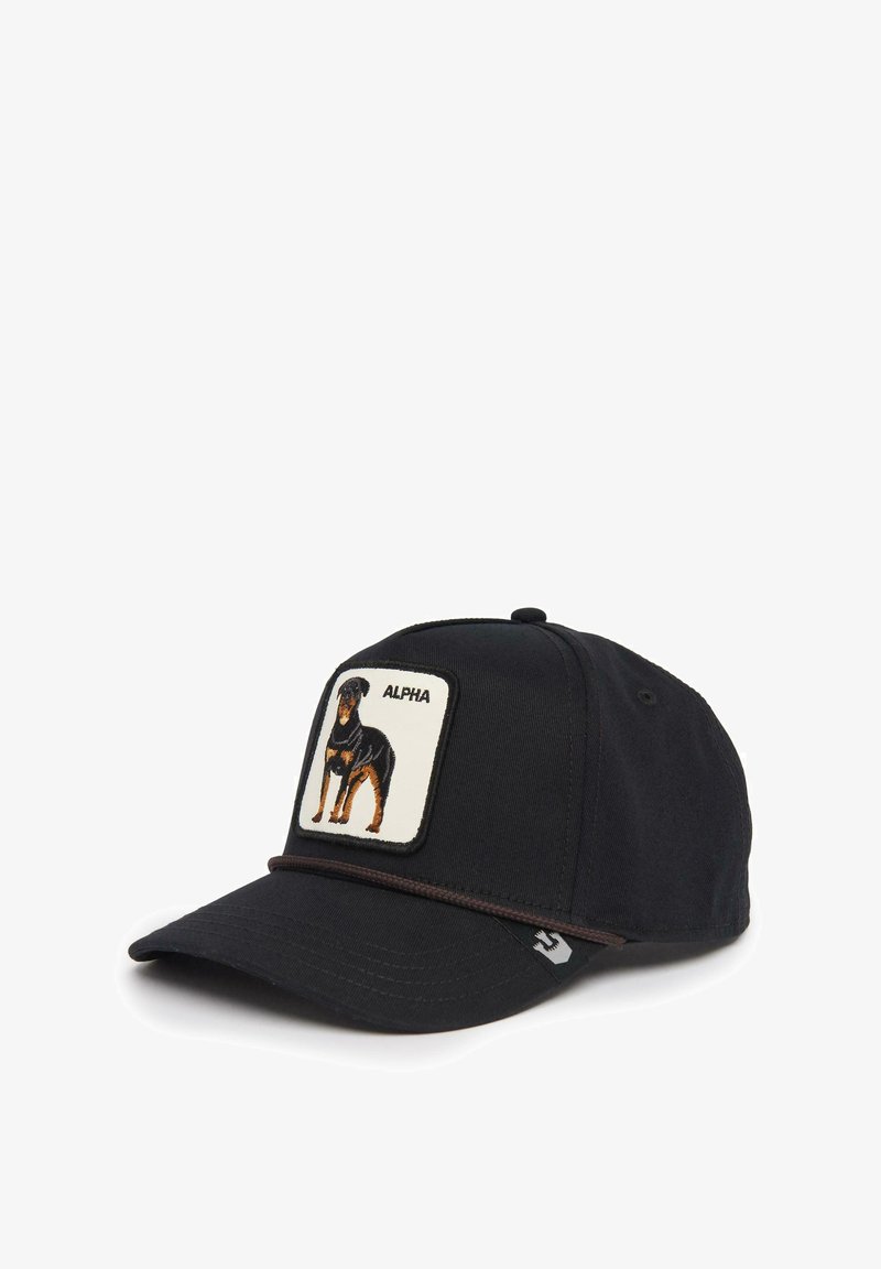 Black baseball cap featuring a stitched Rottweiler patch with "ALPHA" text, and a brown trim along the brim. Cotton material, structured shape.