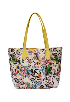 Borsa tote con manici gialli e motivo floreale e astratto colorato su sfondo bianco.