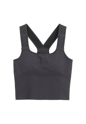Soutien-gorge de sport noir avec une texture côtelée, un design en V dans le dos, des bretelles ajustables et une construction sans coutures pour le confort et le soutien.