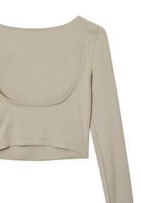 Beige langärmliges, verkürztes Oberteil mit weiter Rundhalsausschnitt und weicher, glatter Textur. Enthält subtile Nähte entlang des Saums.