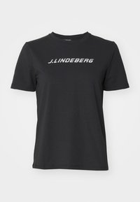 Černé bavlněné tričko s bílým logem "J.Lindberg" na hrudi. Krátké rukávy, kulatý výstřih a standardní střih.