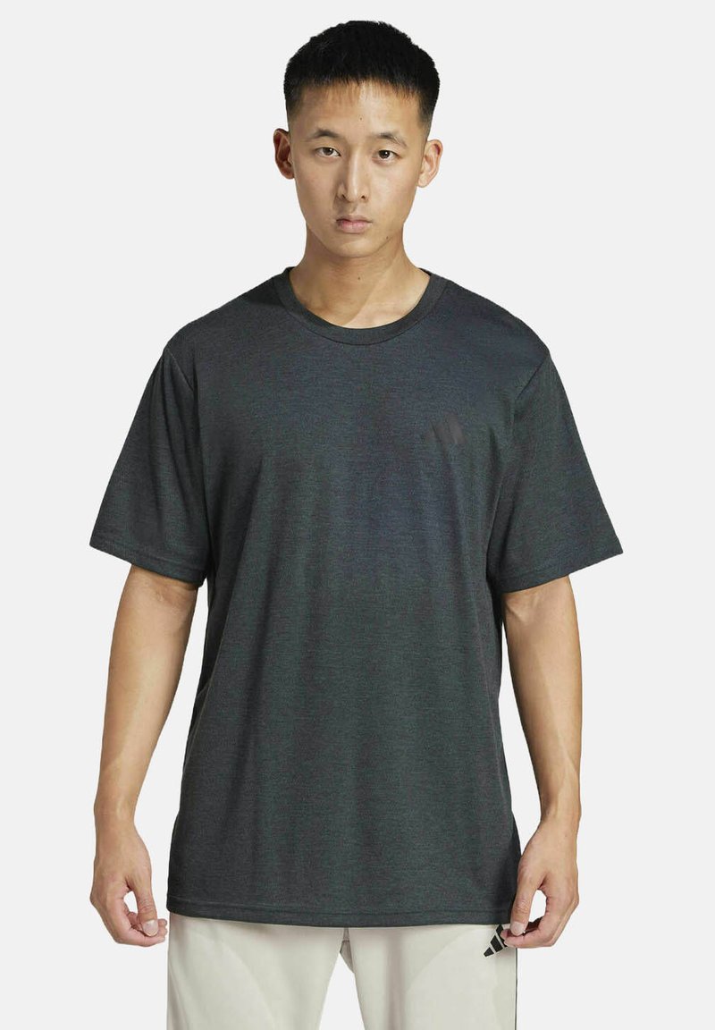 Herren T-Shirt mit kurzen Ärmeln in Dunkelgrau und rundem Ausschnitt, aus einem strukturierten Stoff. Mit einem dezente Logo auf der Brust.