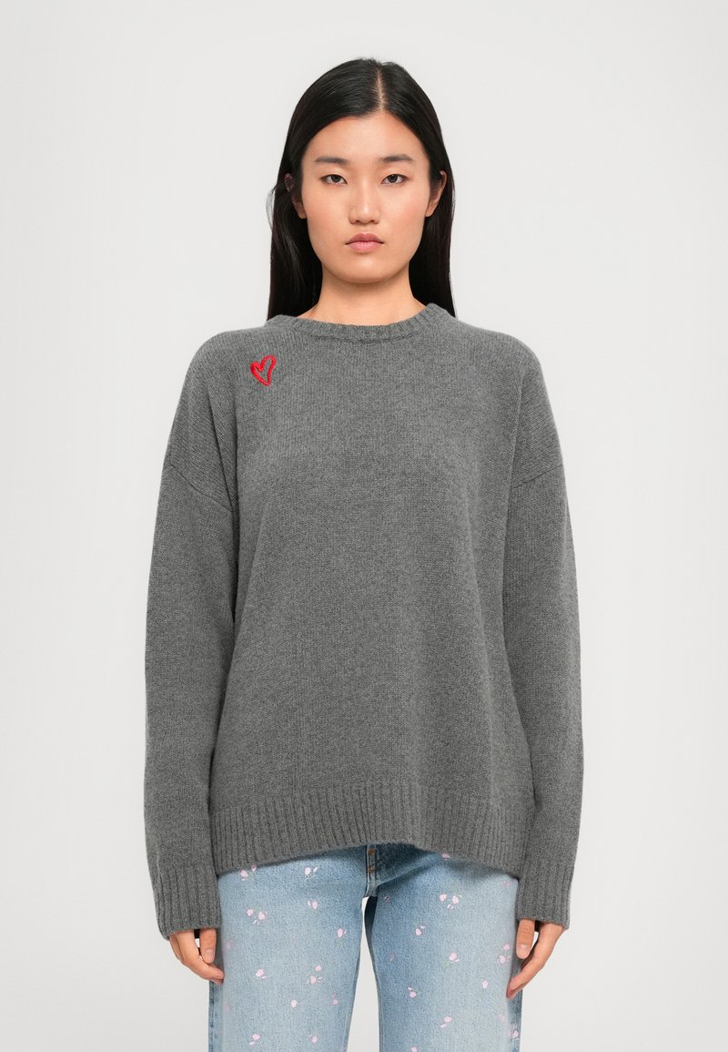 Gray knitted sweater with a round neckline, dropped shoulders, and ribbed hem; features a small red heart embroidery on the left side.