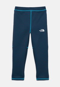 Par izdelka je par mornarsko modrih leggingov s pikčastim vzorcem, ki imajo teal šive in izvezeno logotip na stegnu. Namenjeni so udobju in fleksibilnosti.