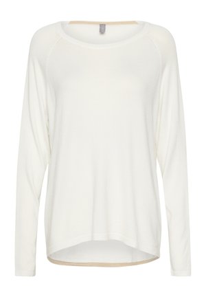 Hvid langærmet top med rund halsudskæring og løs pasform. Blødt stof med en høj-lav kant og ingen synlige mønstre eller hardware.