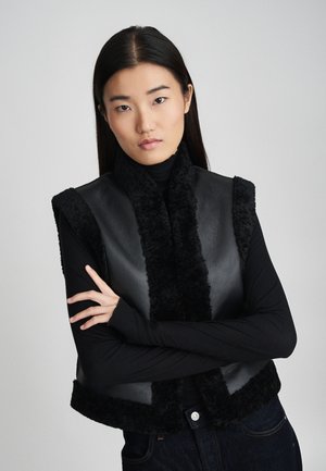 DAMAN - Smanicato - noir