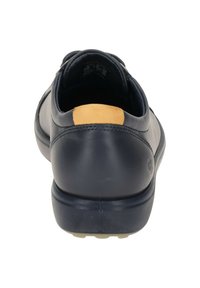 Sneaker da uomo in pelle blu navy con una texture liscia, caratterizzato da un accento color tan sul tallone e una suola ammortizzata per il comfort.