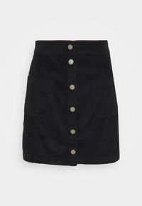 Zwarte corduroy rok met een rechte snit, leren knoopsluiting aan de voorkant met metalen hardware en twee zijzakken. Geweven stofdetails.