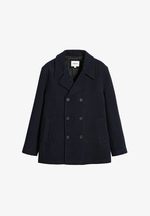 Marineblauw wollen peacoat met een dubbelzijdig ontwerp, grote revers, twee voorzakken en zwarte knopen. Binnenvoering van gestikt stof.