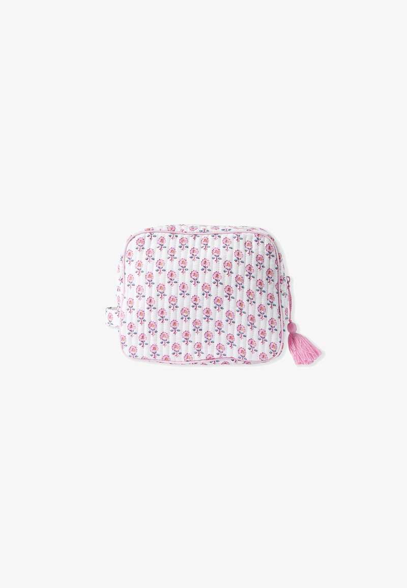 Borsa cosmetica trapuntata con motivo floreale in rosa e viola su sfondo bianco. Presenta un bordo rosa e un tirazip a pompon rosa.