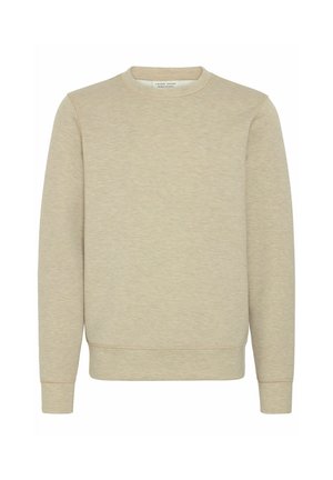 Sweatshirt beige à manches longues en tissu doux, avec un col rond, des poignets côtelés et une finition texturée. Aucun motif ou logo visible.