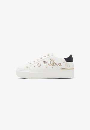 White quilted sneakers with gold accents, decorative motifs including hearts and "love" text, and a black heel counter.