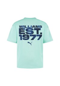 Miętowa bawełniana koszulka z dużym granatowym napisem "WILLIAMS EST. 1977" na plecach oraz małym logiem Pumy na dole. Krótkie rękawy, okrągły dekolt.