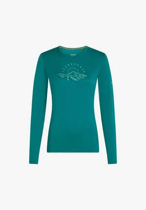 Taubenblaues, langärmliges, eng anliegendes Shirt mit Berg- und Sonnenmotiv und Schriftzug "Icebreaker" auf der Brust, Rundhalsausschnitt und flachen Nähten.