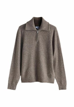 Brun trøje med lynlås ved halsen, ribstrikket krave og manchetter. Blød tekstur, løs pasform og enkel sømdetaljering.