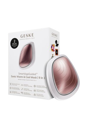 GESKE SmartAppGuidet 9-i-1 Sonic varm & kold maske med rosaguld buet overflade, ved siden af dens hvide emballageæske.
