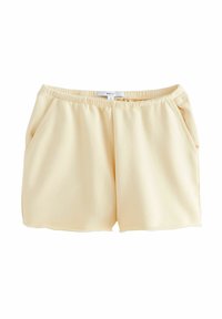 Pantaloni corti color pesca con vita elasticizzata, due tasche laterali e un tessuto leggero e liscio. Senza motivi visibili o elementi metallici.