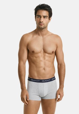 Grijze katoen boxershorts met een donkerblauwe tailleband, voorzien van de merknaam in een herhaald patroon, met een aansluitend ontwerp en een soepele textuur.