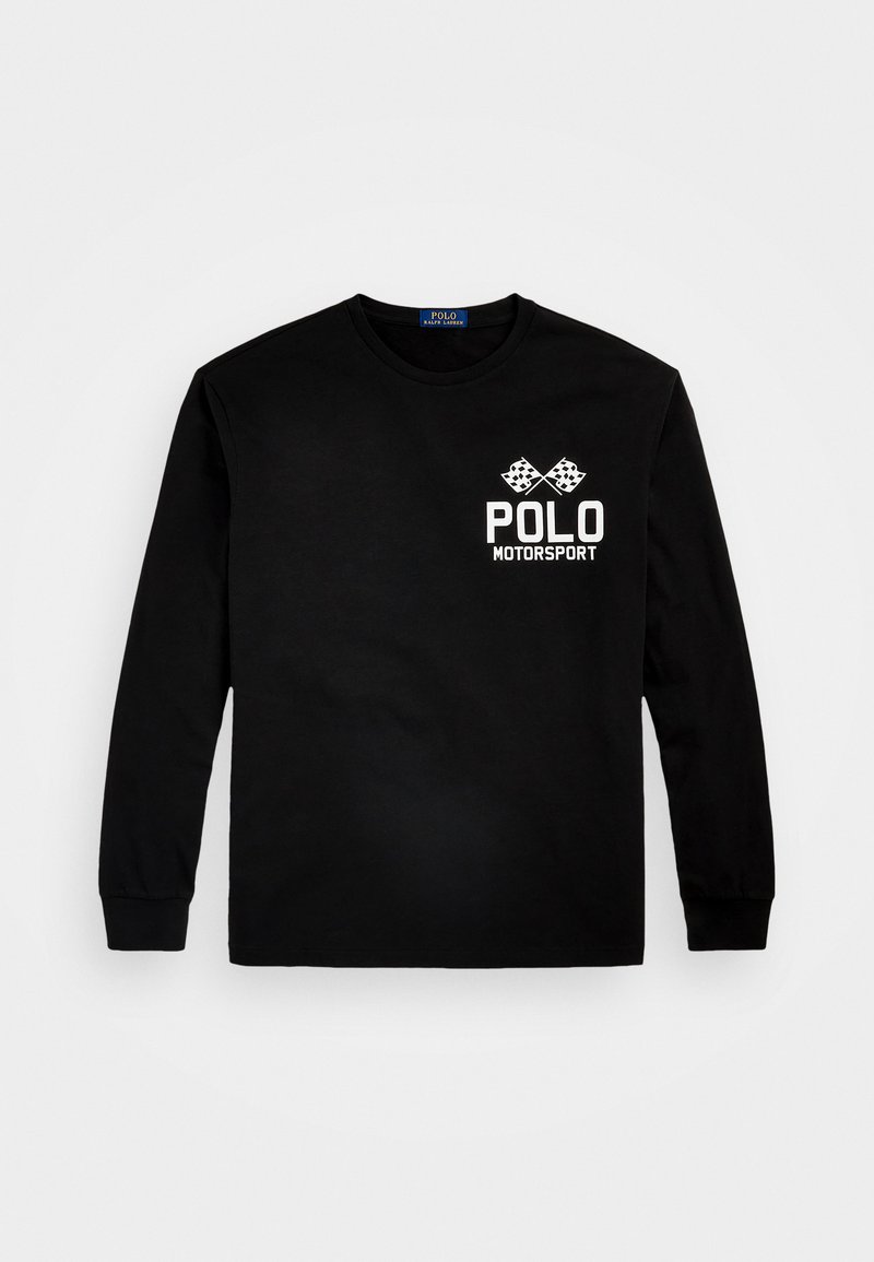 Svart langermet skjorte laget av bomull. Har hvit tekst "POLO MOTORSPORT" og to rutete flagg på venstre brystområde. Rund hals.