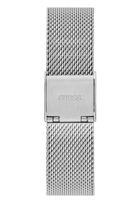 Nerūdijančio plieno tinklelio laikrodžio juostelė, kurią puošia glotni metalinė sagtis su „GUESS“ logotipo graviūra, išryškinanti sudėtingą austą dizainą.