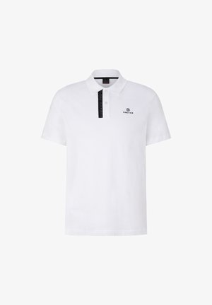 T-shirt polo blanc en coton avec une patte à trois boutons. Doté d'un logo noir et d'une rayure noire contrastante sur le col. Manches courtes.