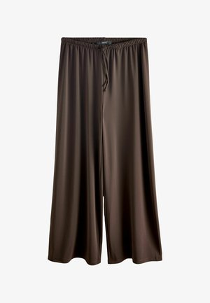 Pruunid laiad püksid, valmistatud sujuvast ja kergekaalulisest kangast. Omavad elastset vööd, millel on reguleeritav nöör, et tagada sobivus.