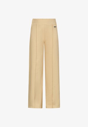 Beżowe spodnie z szerokimi nogawkami o gładkiej teksturze, z pionowymi szwami i elastycznym pasem. Zawierają mały akcent logo po boku.