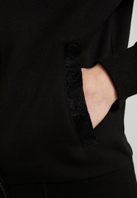 Urban Classics Felpa con zip - black
