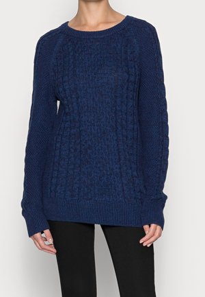 Navyblauwe gebreide trui met een gestructureerd patroon, voorzien van een ronde hals en ribboorden bij de mouwen en onderkant. Gemaakt van een zachte, comfortabele stof.