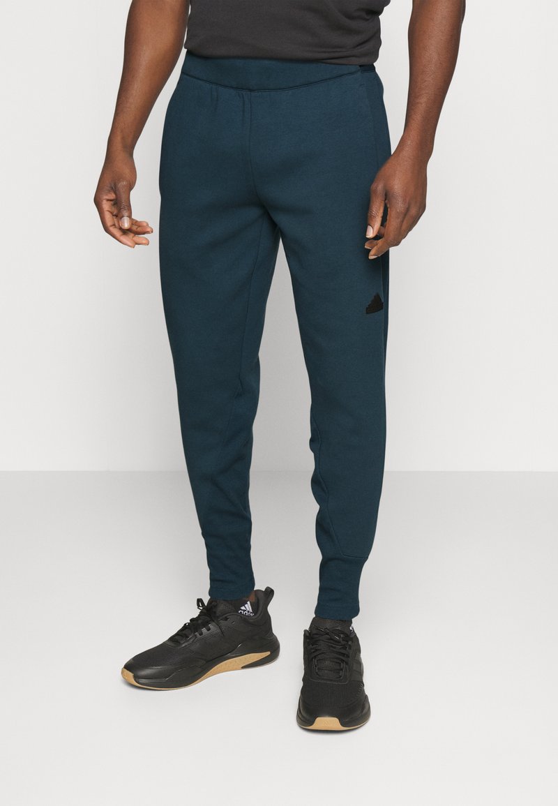 adidas Sportswear Jogginghose arctic night/grün Zalando.de