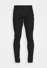 Jeans skinny negros de denim, con un diseño clásico de cinco bolsillos, trabillas para cinturón y cierre frontal de botón. Textura suave.