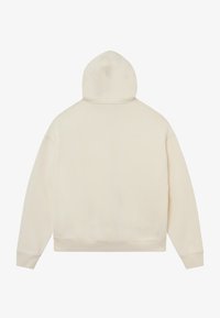 Κρέμα χρώματος hoodie με στρογγυλή κουκούλα και ραμμένες μανσέτες. Κατασκευασμένο από μαλακό υλικό, με ριγωτές μανσέτες και τελείωμα. Απλός και μινιμαλιστικός σχεδιασμός.