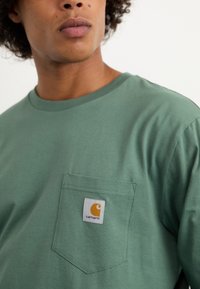 Carhartt WIP POCKET - Hosszú ujjú felső - duck green