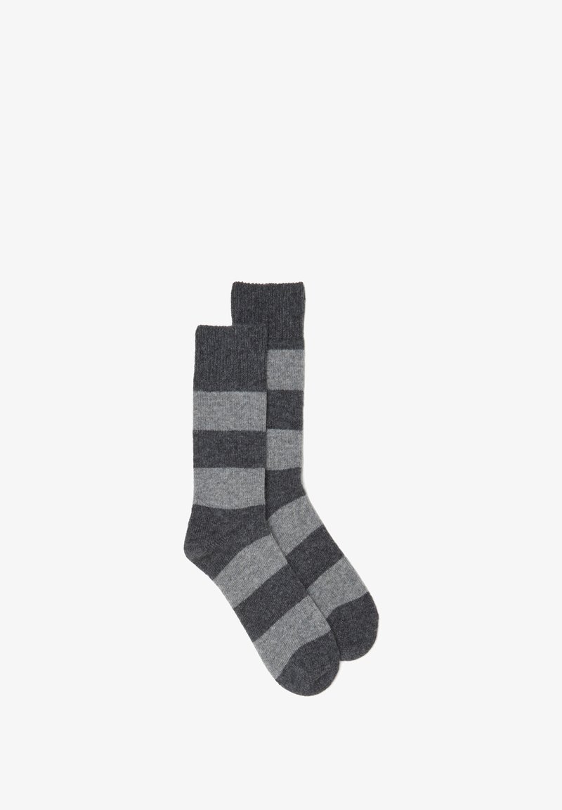 Gestreifte Socken in Dunkelgrau und Hellgrau. Hergestellt aus weichem Material mit gerippter Textur. Verfügt über einen verstärkten Bund an der Oberseite.