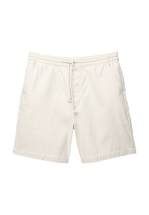 Pantaloni corti di cotone beige chiaro con vita elasticizzata, cordoncino e due tasche laterali. Texture liscia e vestibilità comoda con un design semplice.