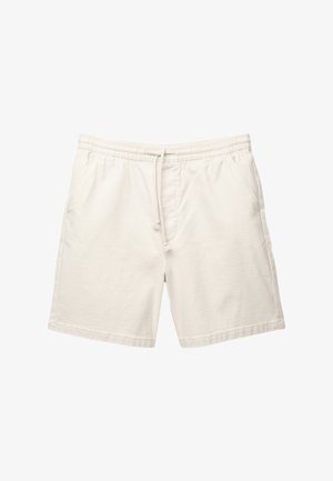 Shorts en coton beige clair avec une taille élastique, un cordon de serrage et deux poches latérales. Texture lisse et coupe décontractée avec un design simple.