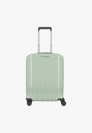 Hartschalentrolley in Hellgrün, mit einem gerippten Design, ausziehbarem Griff und vier leichtgängigen Rollen für optimale Manövrierbarkeit.